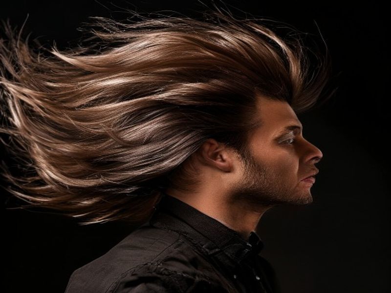 Action shot of the toupee with wind blowing